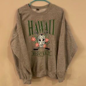 Worn in grey Hawaii hockey crew neck sweatshirt